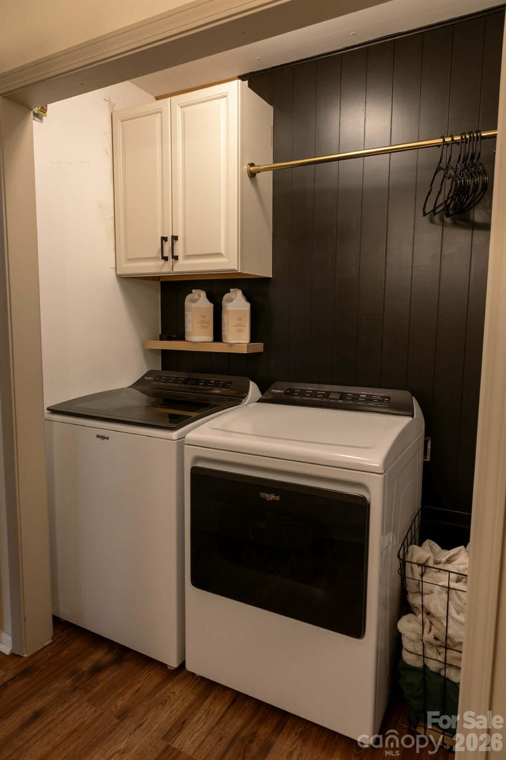 202 East Rice Street Landis, NC 28088 - Photo 17 of 23 a view of washer and dryer with wooden floor