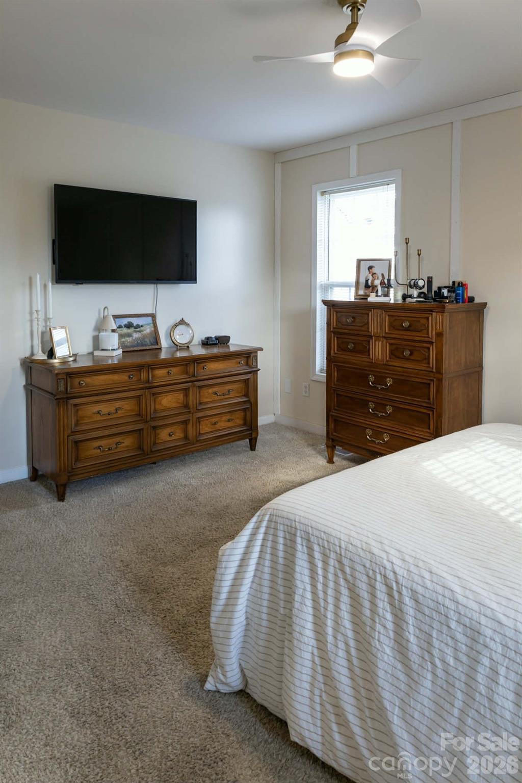 202 East Rice Street Landis, NC 28088 - Photo 22 of 23 a bed room with furniture and flat screen tv