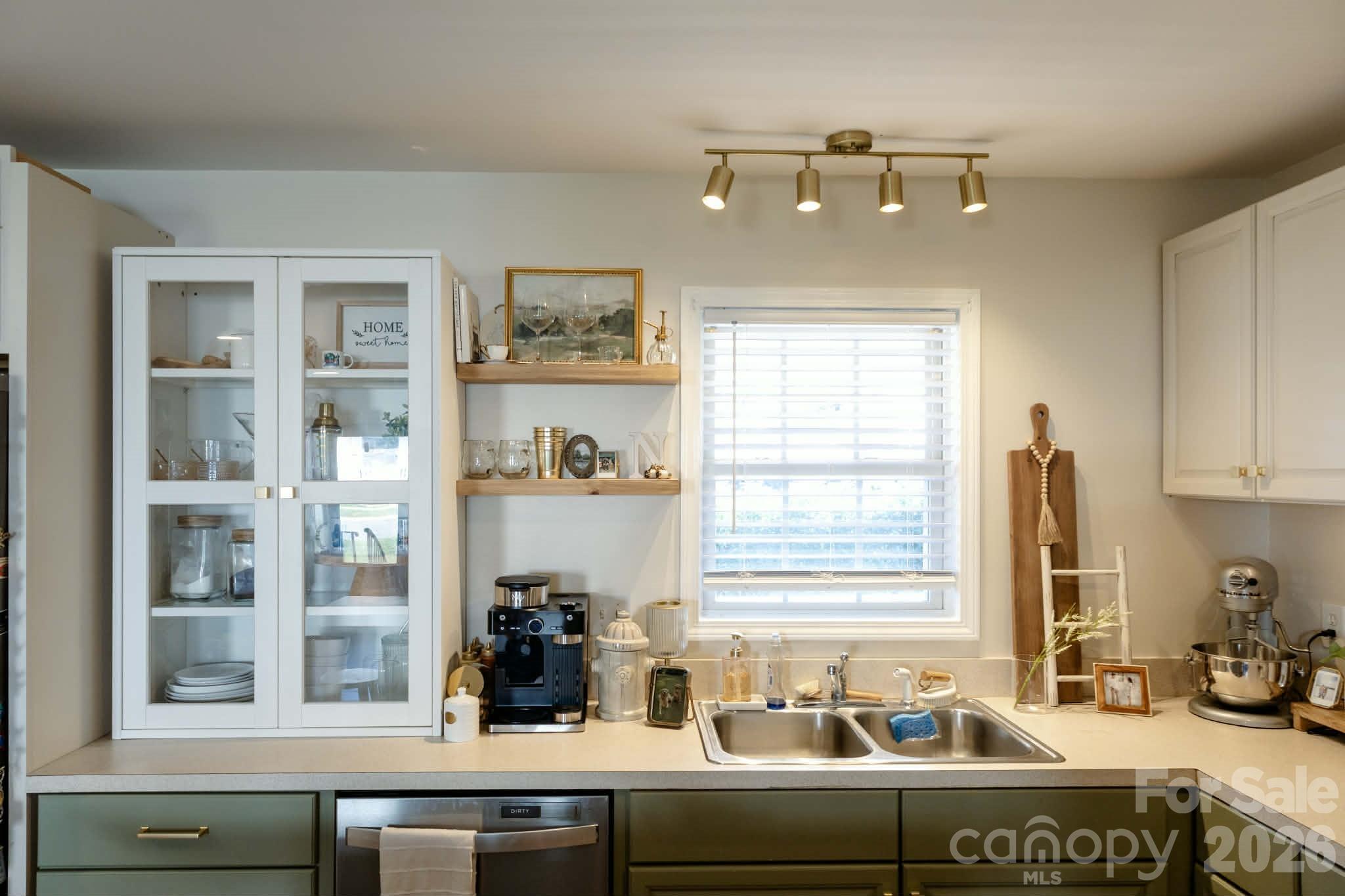 202 East Rice Street Landis, NC 28088 - Photo 10 of 23 a kitchen with a sink and a window