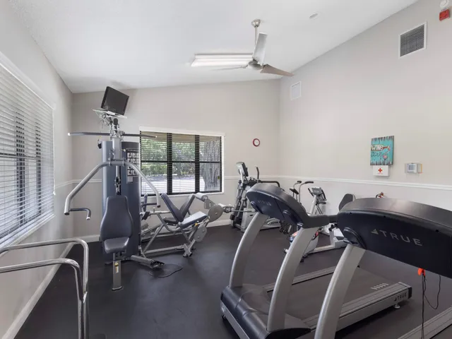 a view of a room with gym equipment