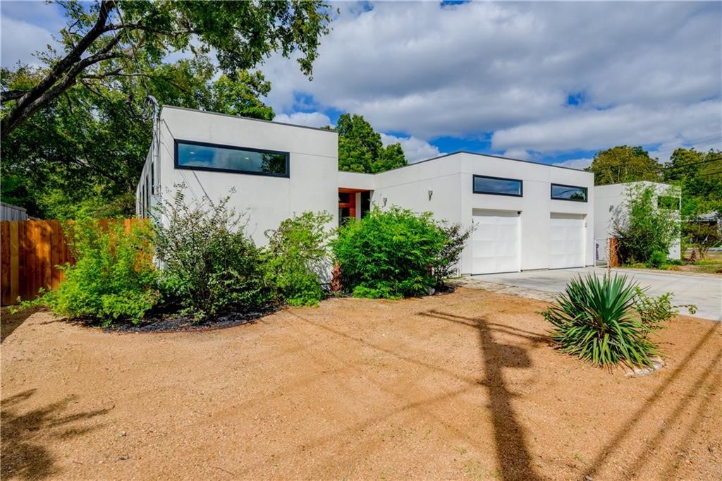 1401 Alegria Road, Unit B Austin, TX 78757 - Photo 1 of 1 a front view of a house with garden