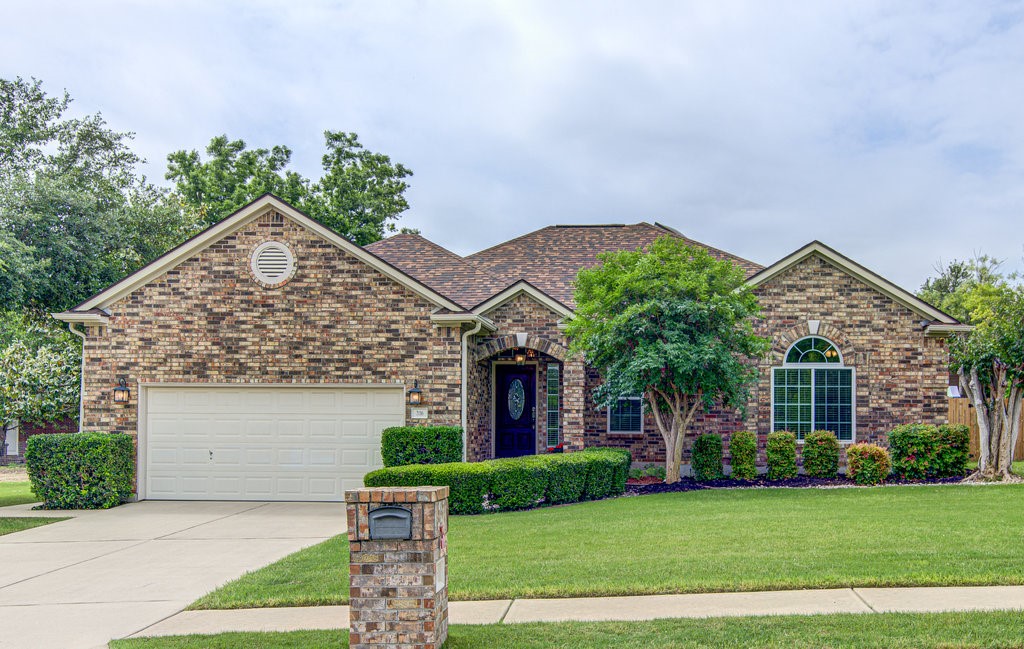 Gorgeous curb appeal! This yard is the real thing!