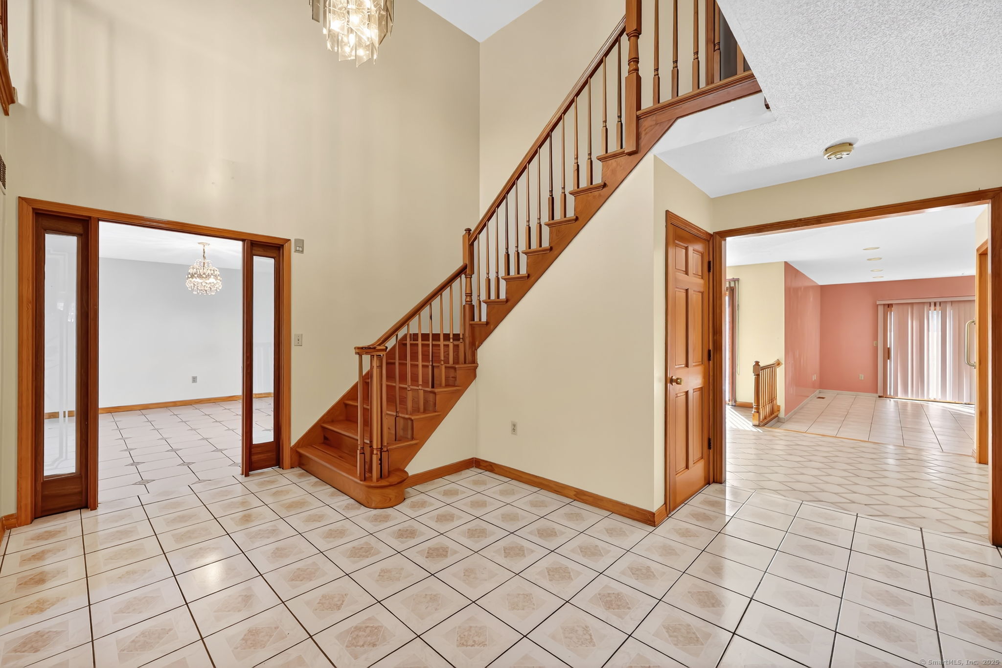 208 Highmeadow Lane Middletown, CT 06457 - Photo 14 of 34 a view of a hallway with wooden floor and staircase