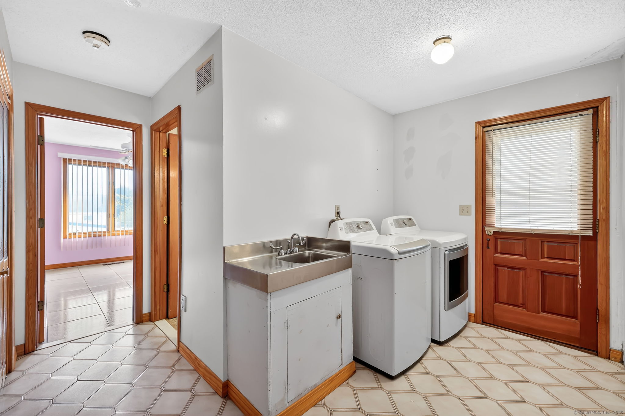 208 Highmeadow Lane Middletown, CT 06457 - Photo 25 of 34 a view of a kitchen with washer and dryer