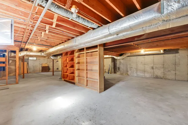 a view of a house with swimming pool and sitting area