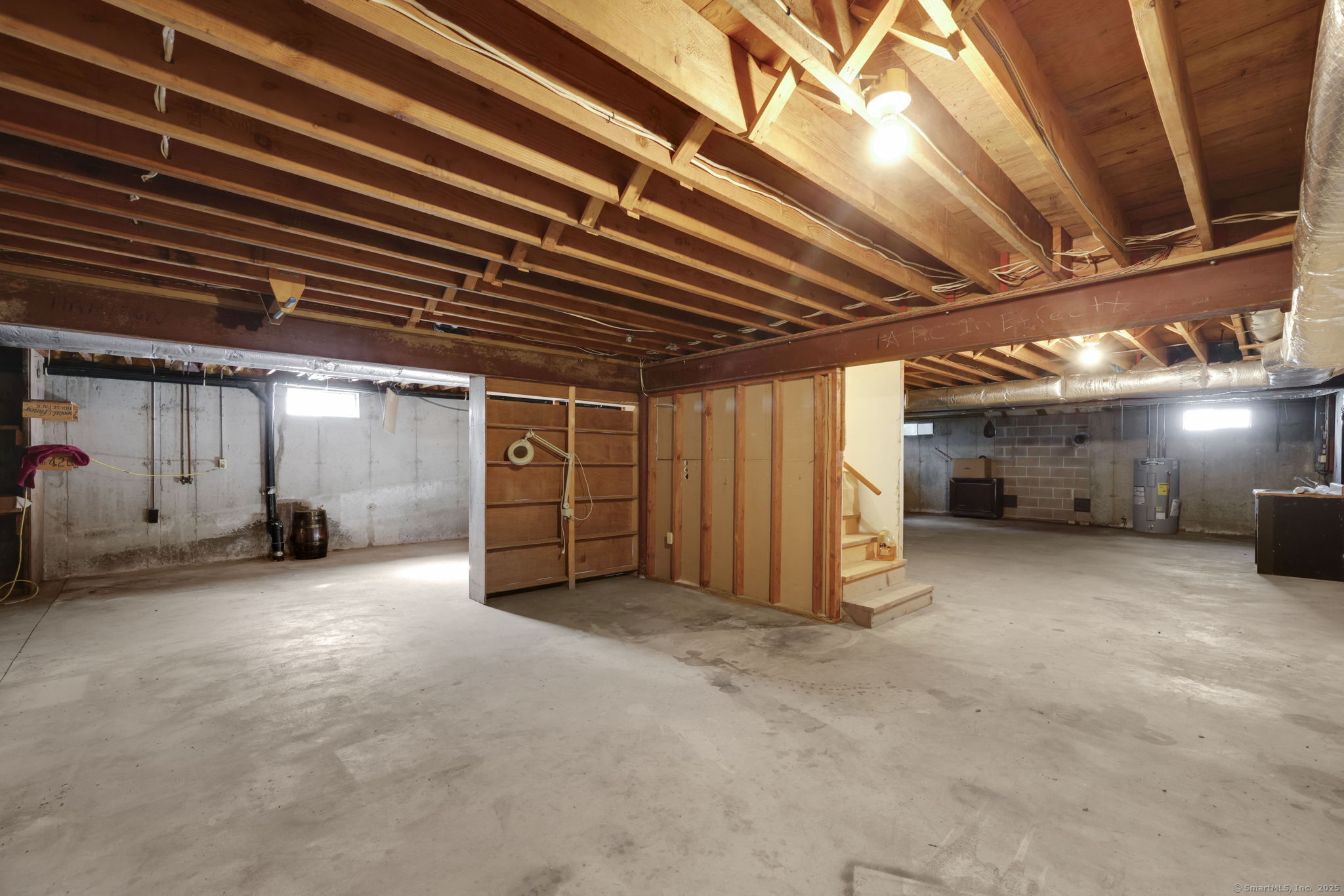 208 Highmeadow Lane Middletown, CT 06457 - Photo 9 of 34 a view of empty room with wooden walls
