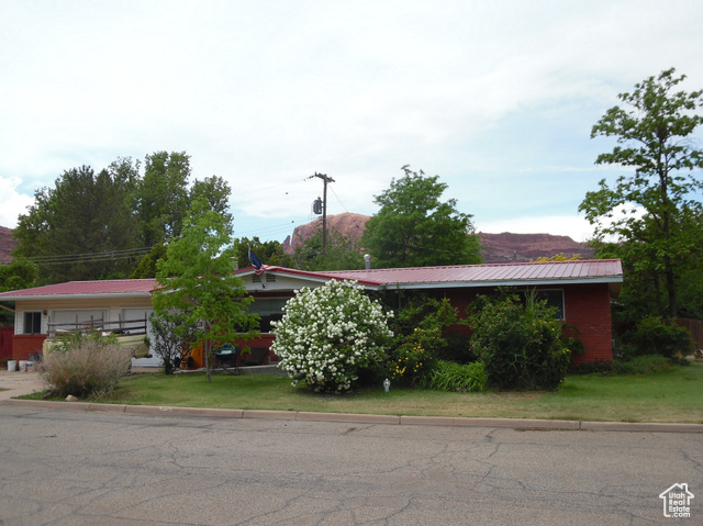 477 Grand Circle Moab, UT 84532 - Photo 1 of 22 View of front of home with metal roof
