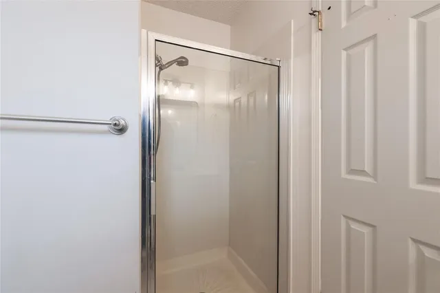 a bathroom with a sink a mirror and a toilet