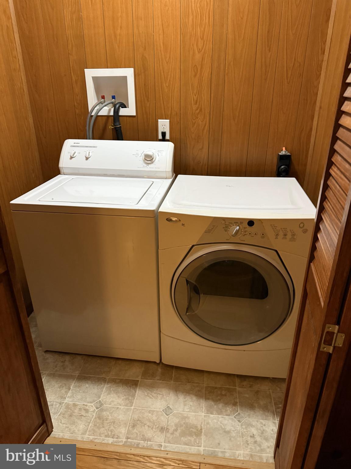 4870 Calvert Drive St. Leonard, MD 20685 - Photo 7 of 10 a utility room with dryer and washer