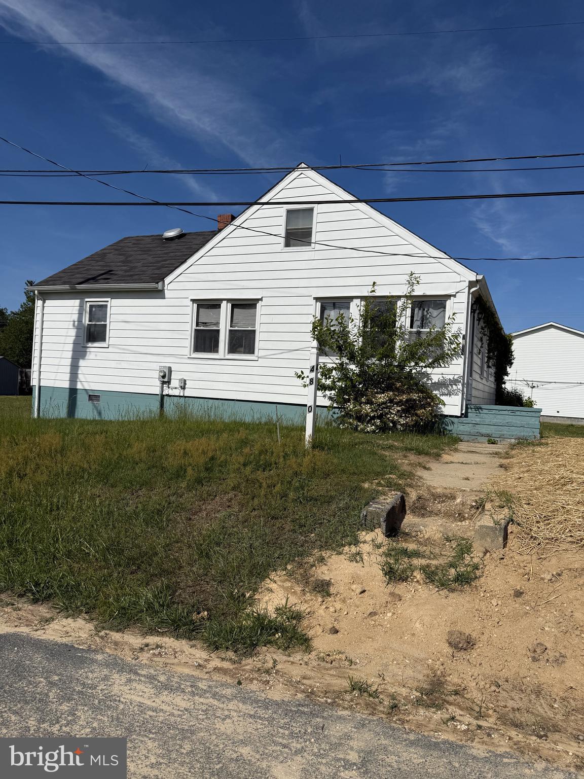 4870 Calvert Drive St. Leonard, MD 20685 - Photo 9 of 10 a front view of house with yard