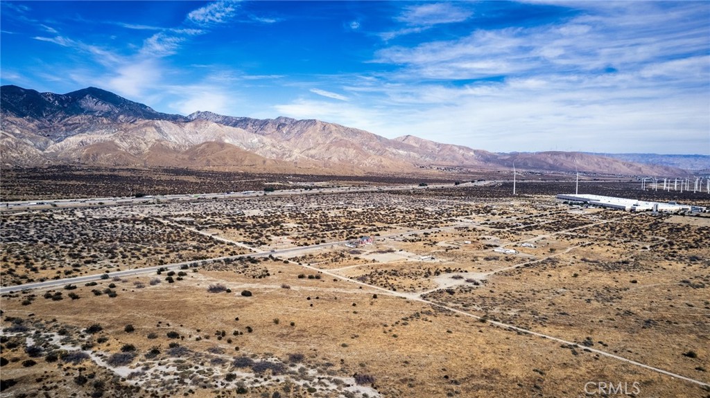 0 Ilyse Cabazon, CA 92230 - Photo 14 of 14 a view of a large body of water with a building in the background