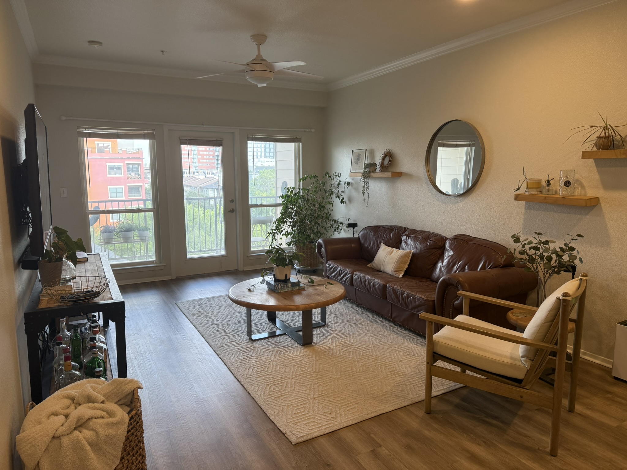 910 West 25th Street, Unit 508 Austin, TX 78705 - Photo 2 of 14 a living room with furniture and a flat screen tv