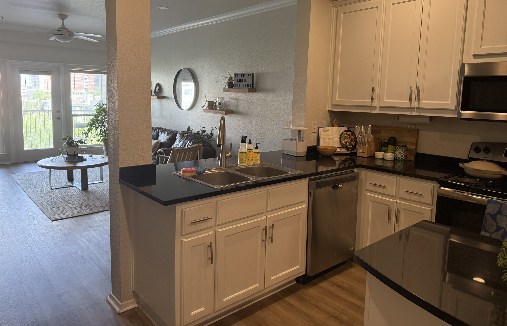 910 West 25th Street, Unit 508 Austin, TX 78705 - Photo 5 of 14 a kitchen with a sink and cabinets
