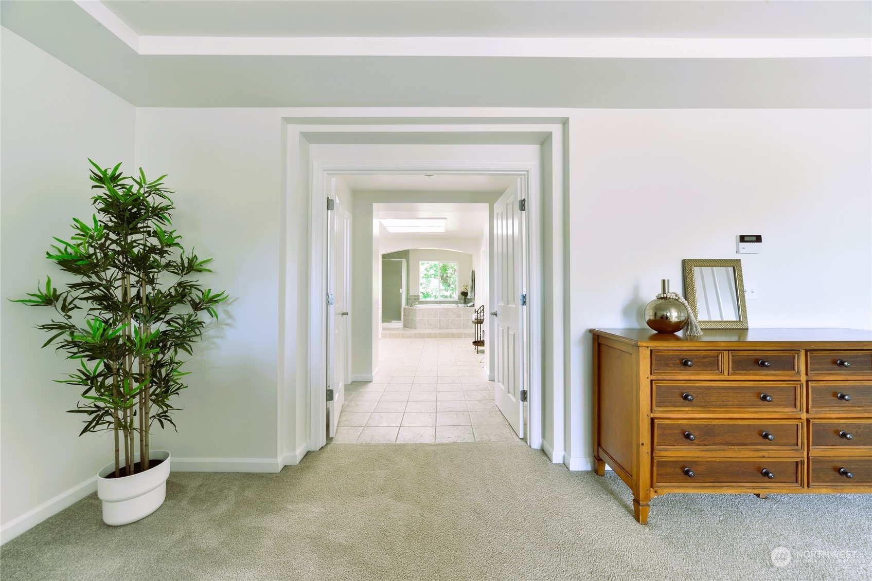16520 Southeast 165th Way Renton, WA 98058 - Photo 22 of 35 a view of a hallway to room with wooden floor