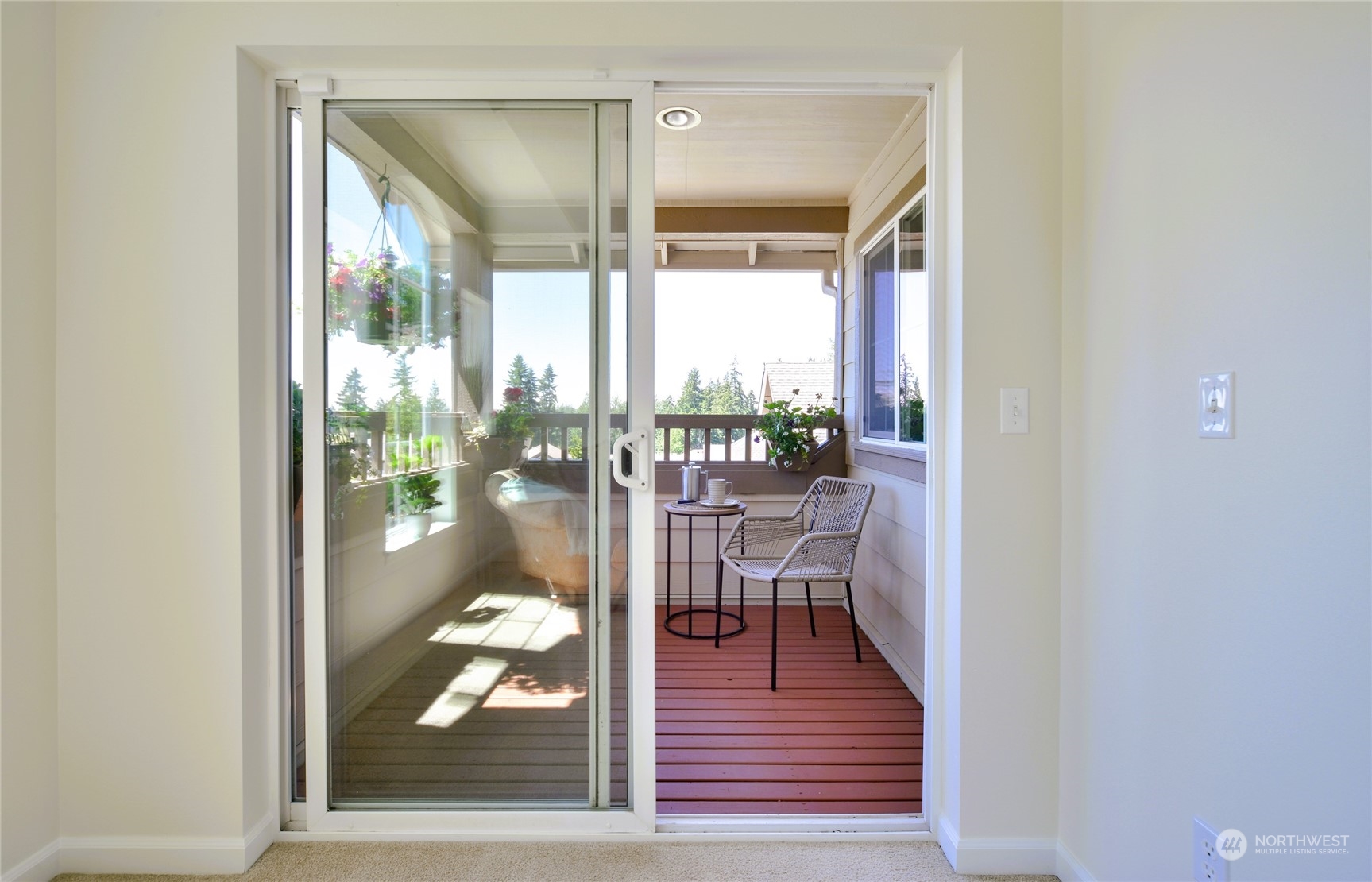 16520 Southeast 165th Way Renton, WA 98058 - Photo 25 of 35 a room with wooden floor and a glass door
