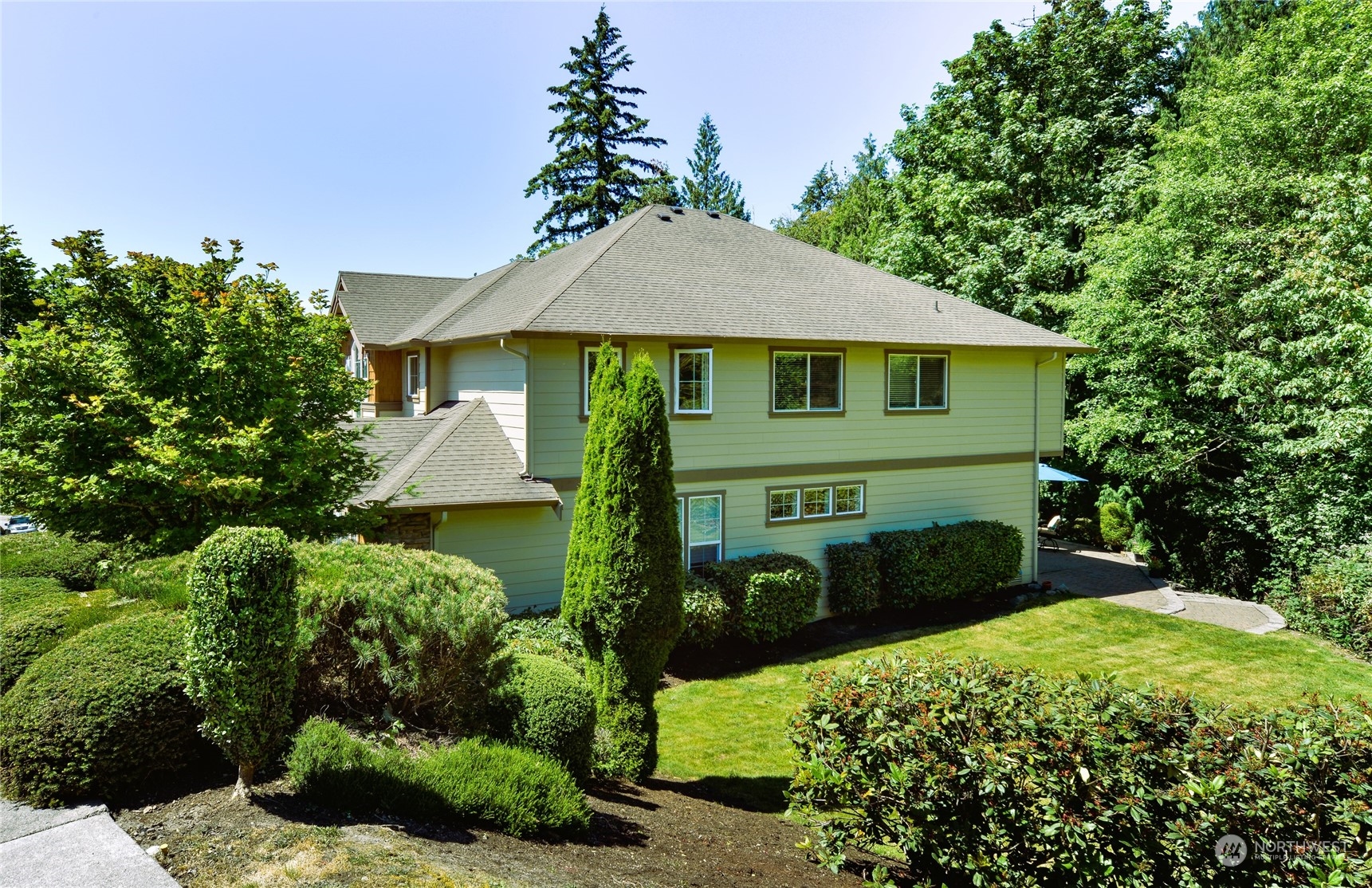 16520 Southeast 165th Way Renton, WA 98058 - Photo 3 of 35 a front view of a house with a yard