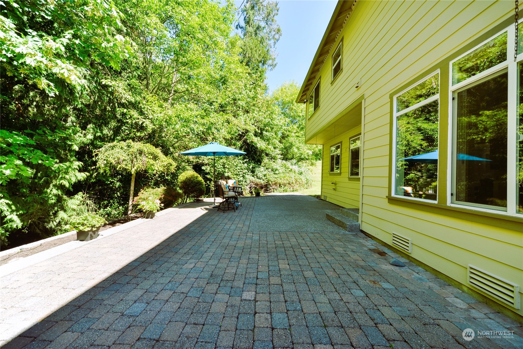 16520 Southeast 165th Way Renton, WA 98058 - Photo 35 of 35 a view of a pathway both side of the house