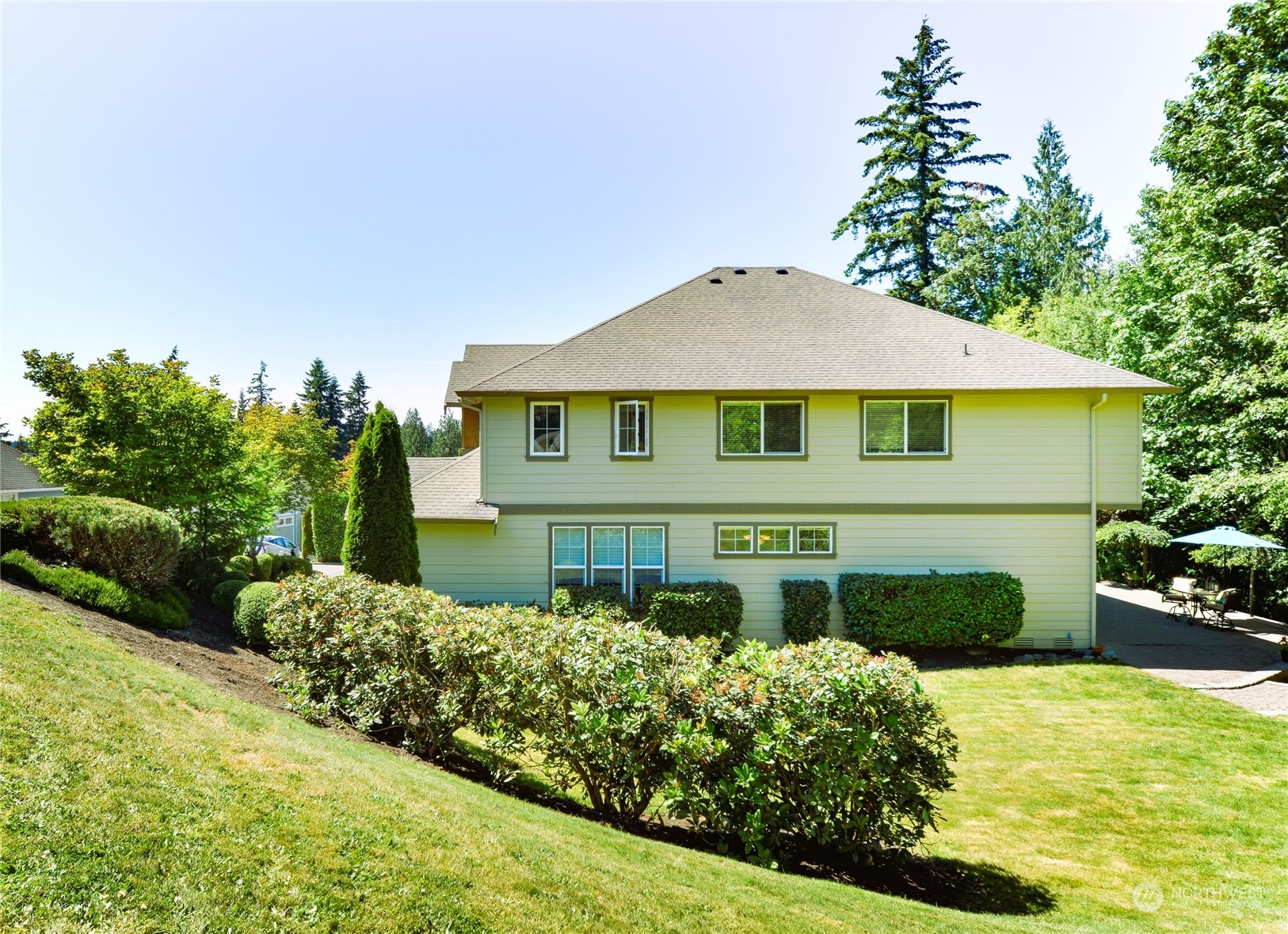 16520 Southeast 165th Way Renton, WA 98058 - Photo 4 of 35 a front view of a house with a yard