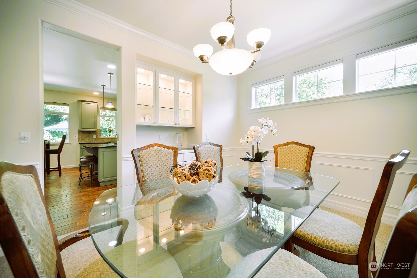 16520 Southeast 165th Way Renton, WA 98058 - Photo 9 of 35 a dining room with furniture and wooden floor