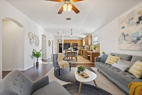 a bedroom with a bed and a table