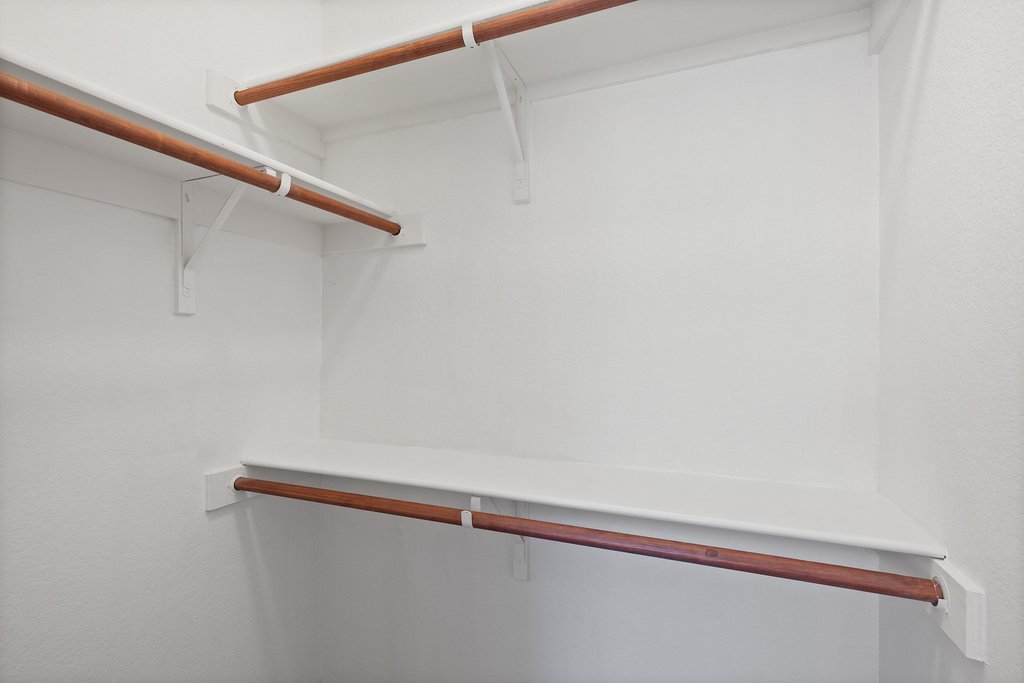 218 Calline Mayes Run Buda, TX 78610 - Photo 18 of 27 a close up view of racks on the wall