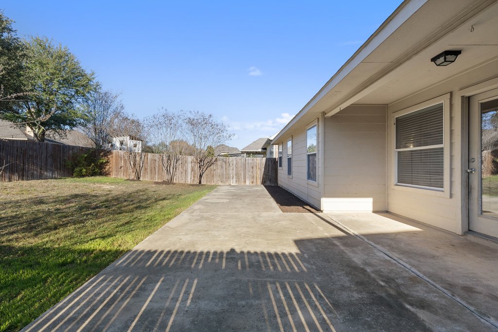 218 Calline Mayes Run Buda, TX 78610 - Photo 24 of 27 Spacious Back Patio