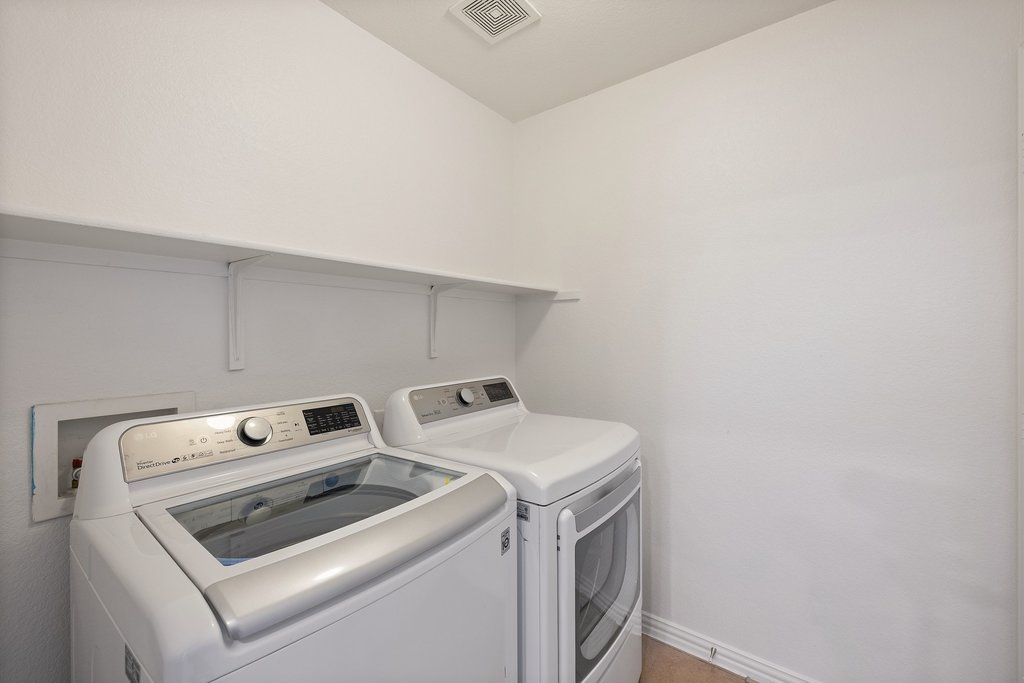 218 Calline Mayes Run Buda, TX 78610 - Photo 26 of 27 Laundry room off of Garage