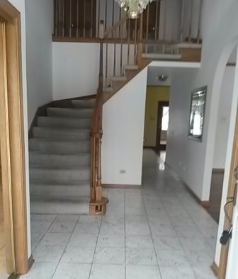 20206 Mohawk Trail Olympia Fields, IL 60461 - Photo 2 of 15 a view of entryway and hall with a wooden floor