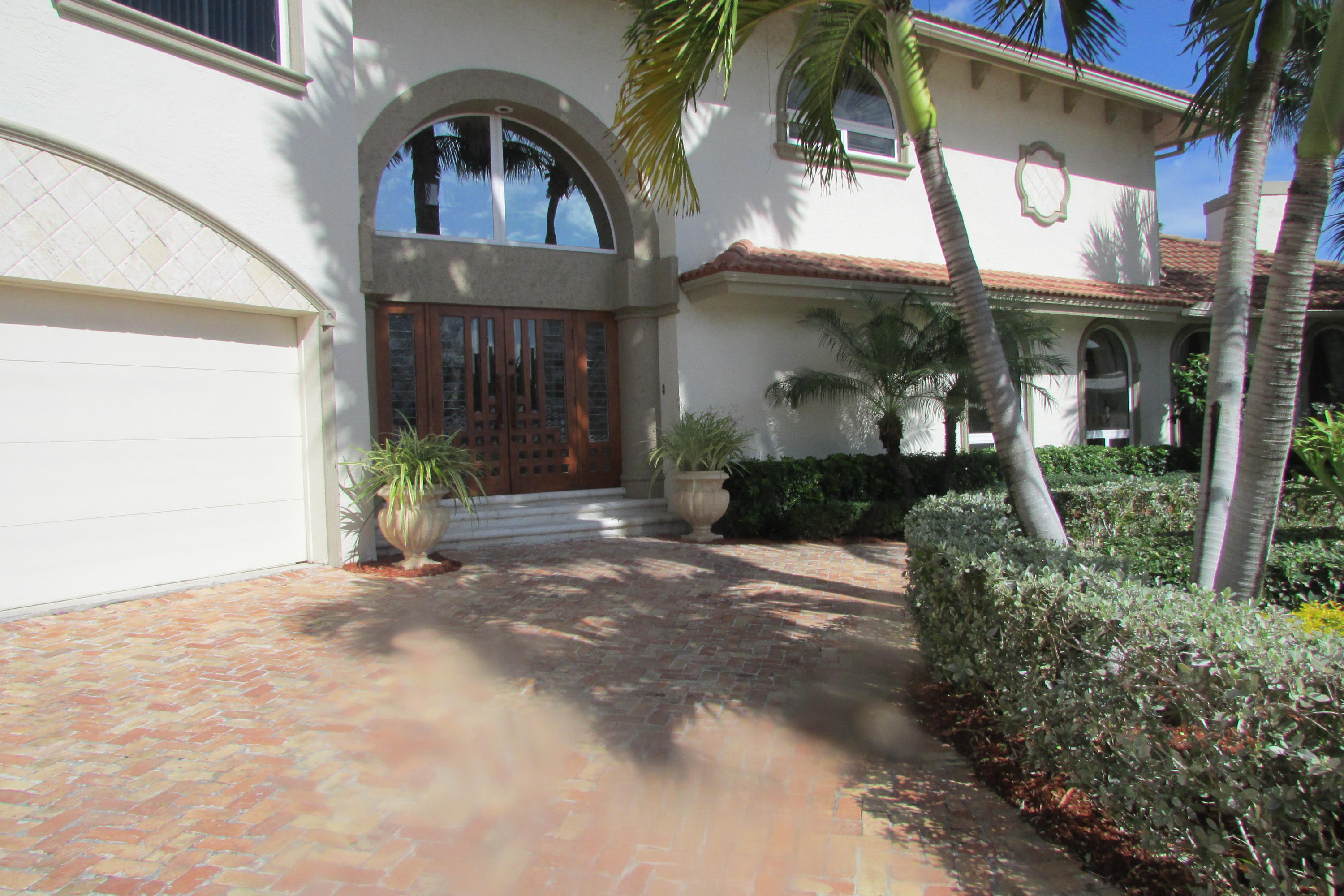 891 Northeast 78th Street Boca Raton, FL 33487 - Photo 5 of 35 Driveway Entrance