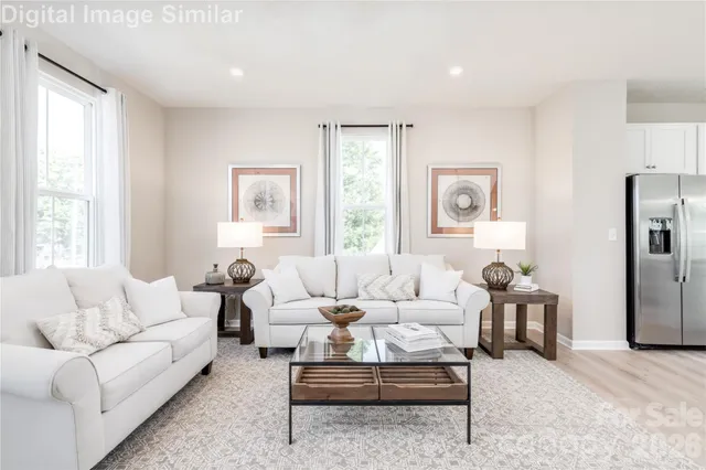 a living room with furniture or couch and a window