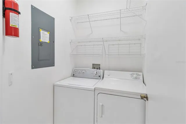 a utility room with dryer and washer