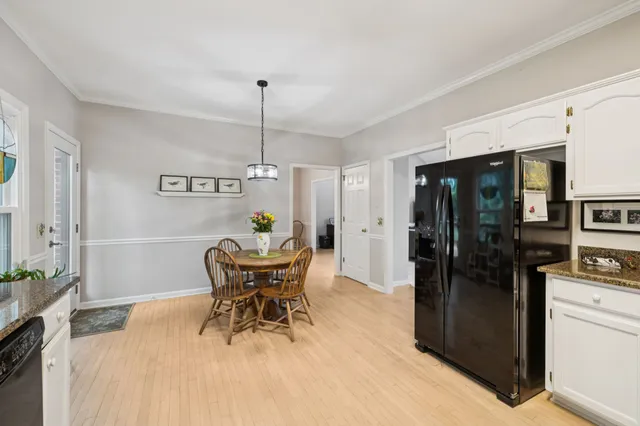 a view of a dining room with furniture