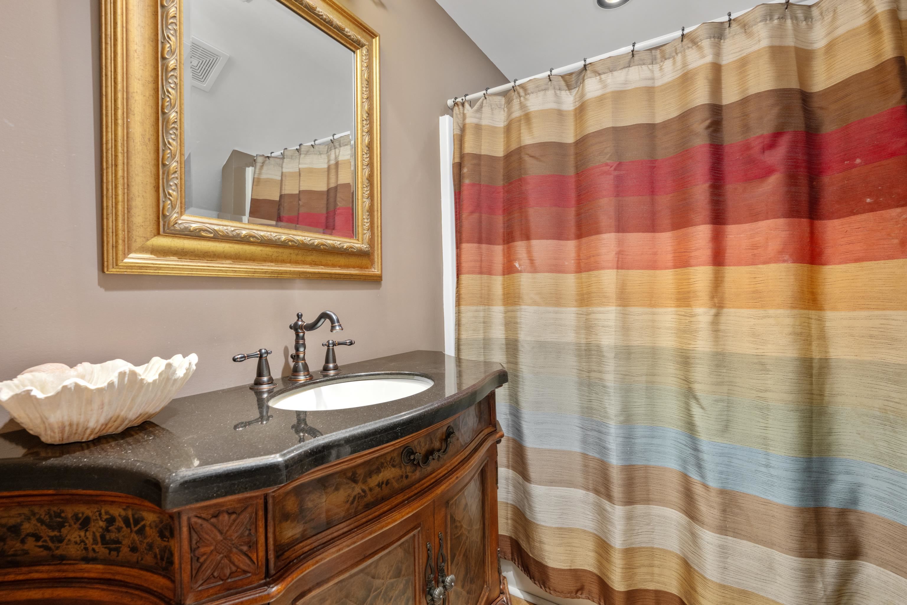 685 River Cliff Lane Counce, TN 38326 - Photo 14 of 39 a bathroom with a sink and a mirror