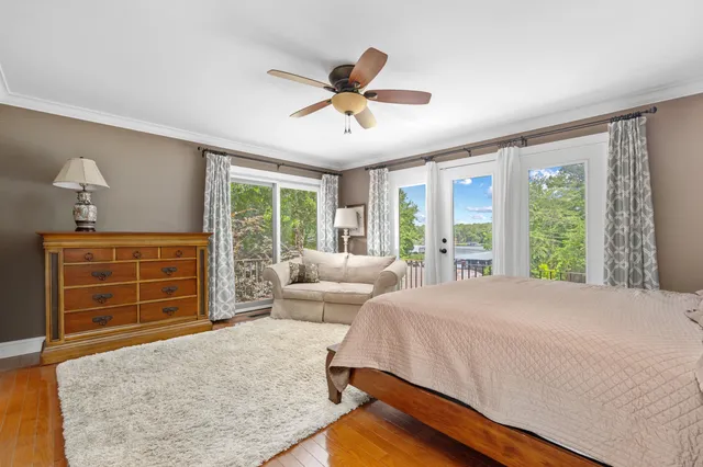 a bed room with a bed and a window