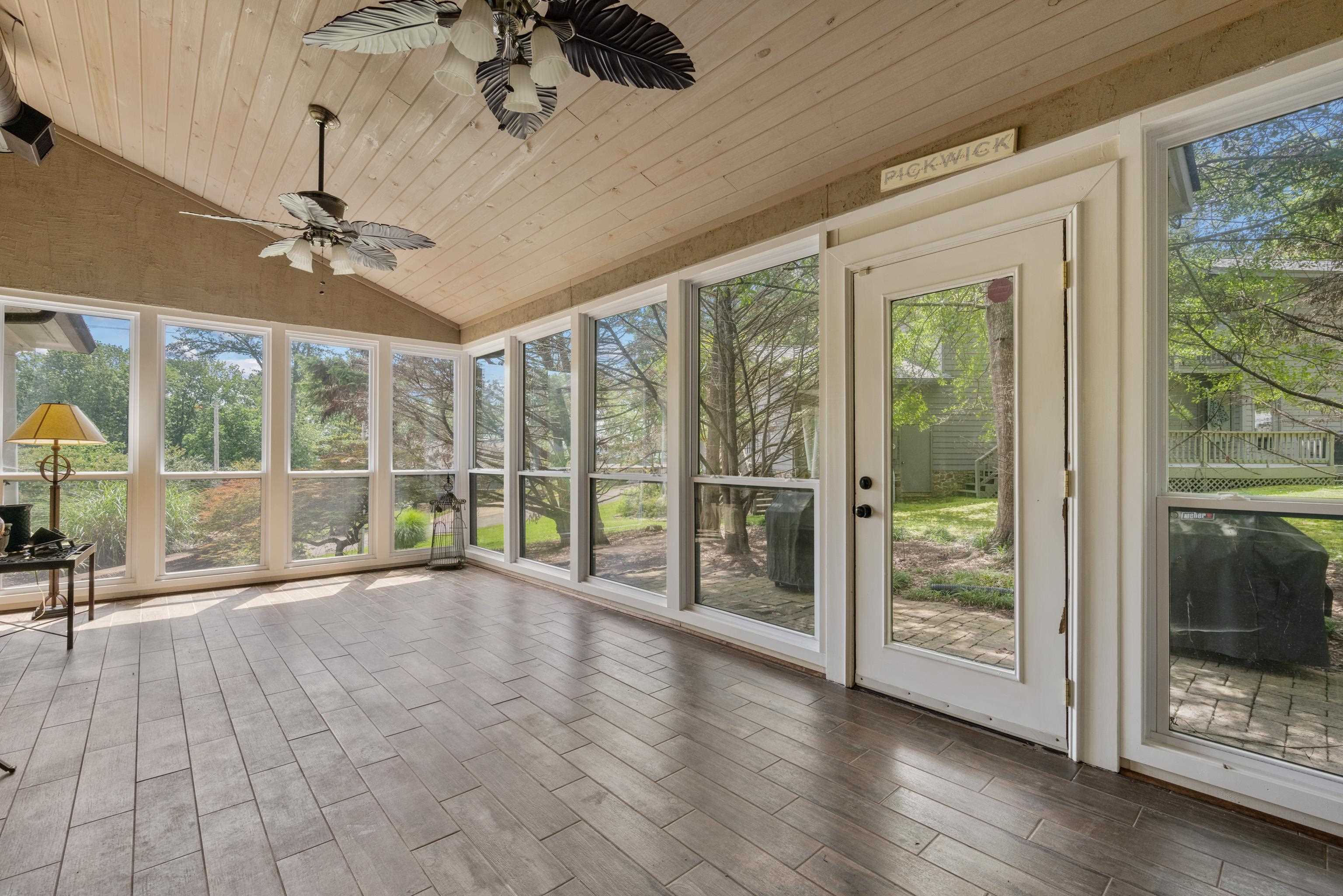 685 River Cliff Lane Counce, TN 38326 - Photo 31 of 39 a view of empty room with wooden floor and fan
