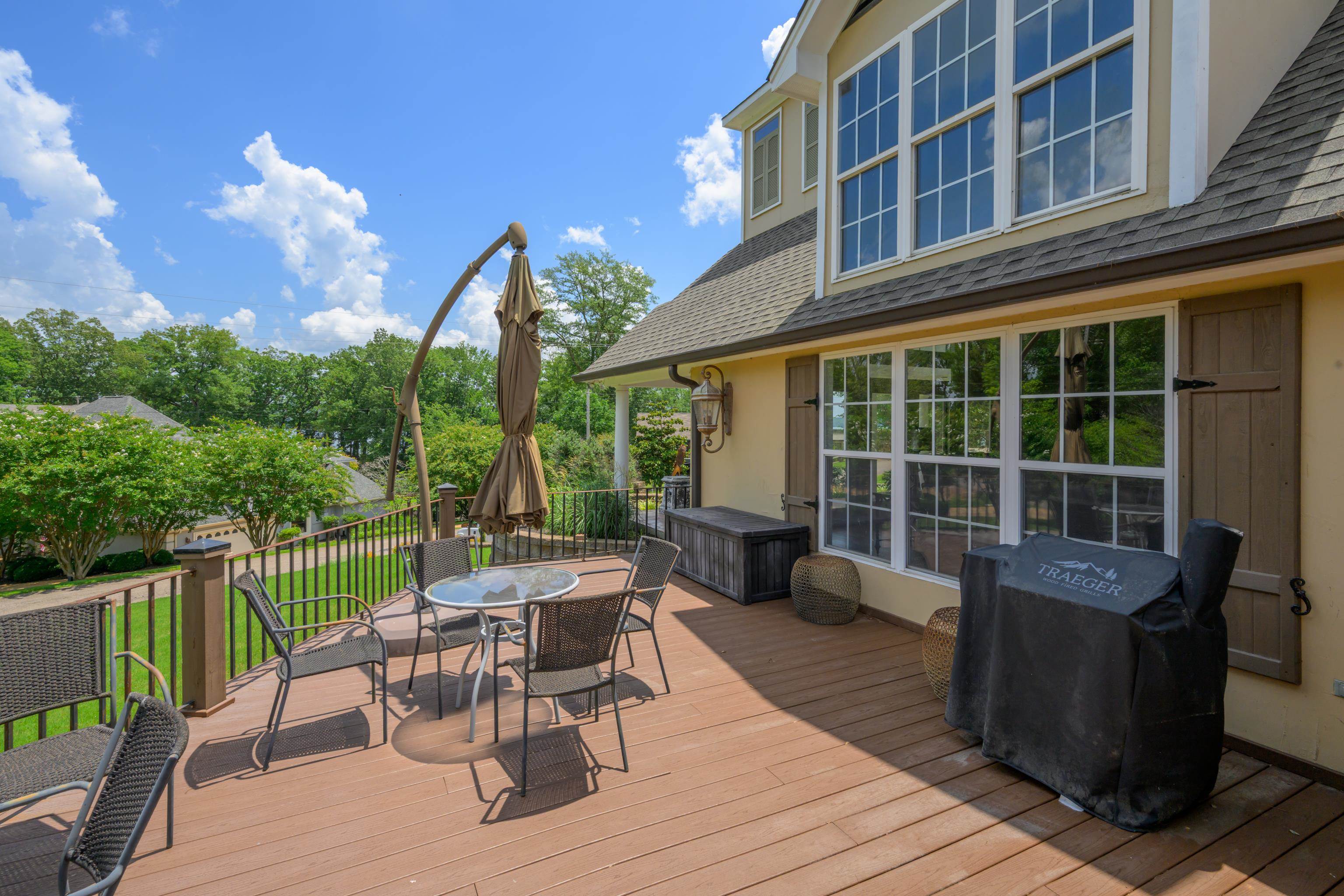 685 River Cliff Lane Counce, TN 38326 - Photo 38 of 39 a view of a patio with couches potted plants and a wooden floor