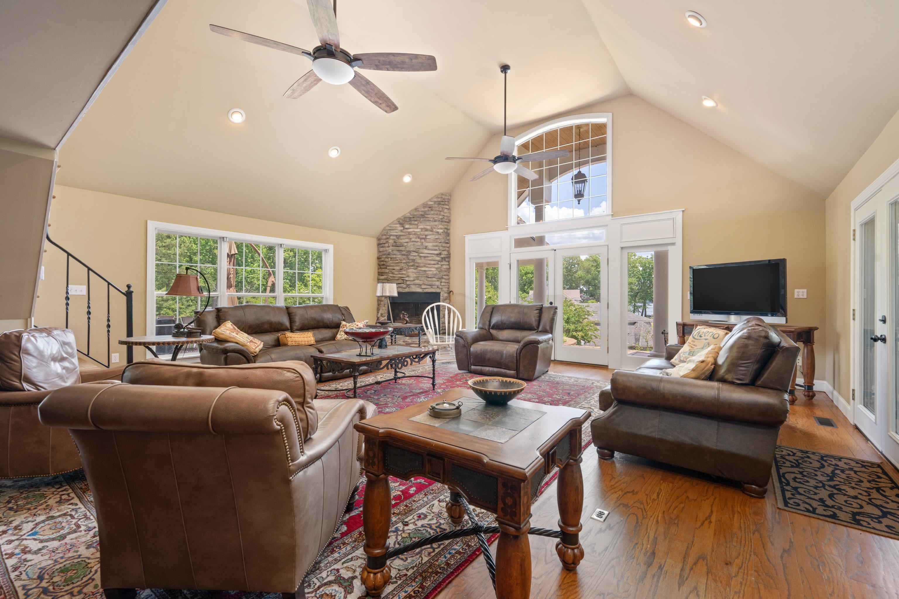685 River Cliff Lane Counce, TN 38326 - Photo 6 of 39 a living room with furniture fireplace and a large window