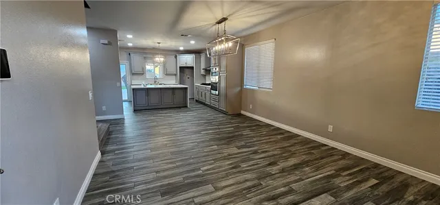 a view of a kitchen with a sink