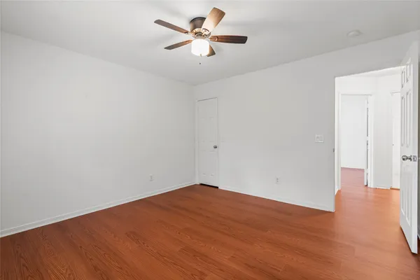 a view of a big room with wooden floor