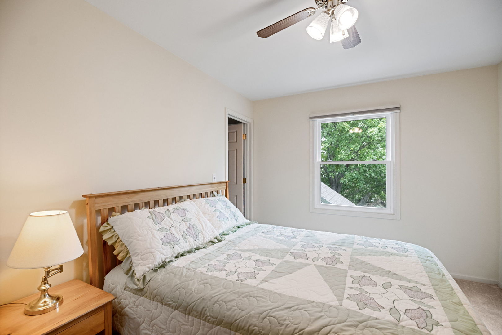 145 Barnes Road Elgin, IL 60124 - Photo 11 of 45 a bedroom with a bed and a window