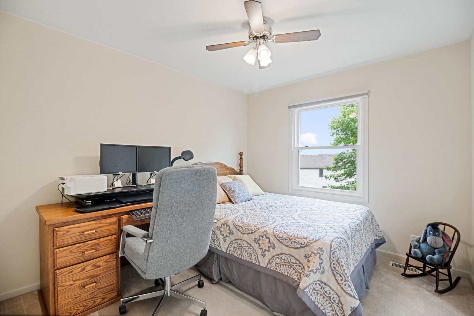 145 Barnes Road Elgin, IL 60124 - Photo 14 of 45 a bedroom with a bed and chair