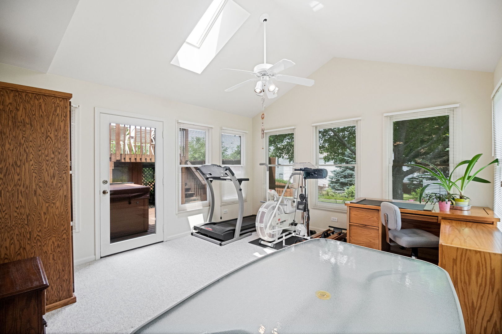 145 Barnes Road Elgin, IL 60124 - Photo 24 of 45 a living room with furniture a chandelier and a window