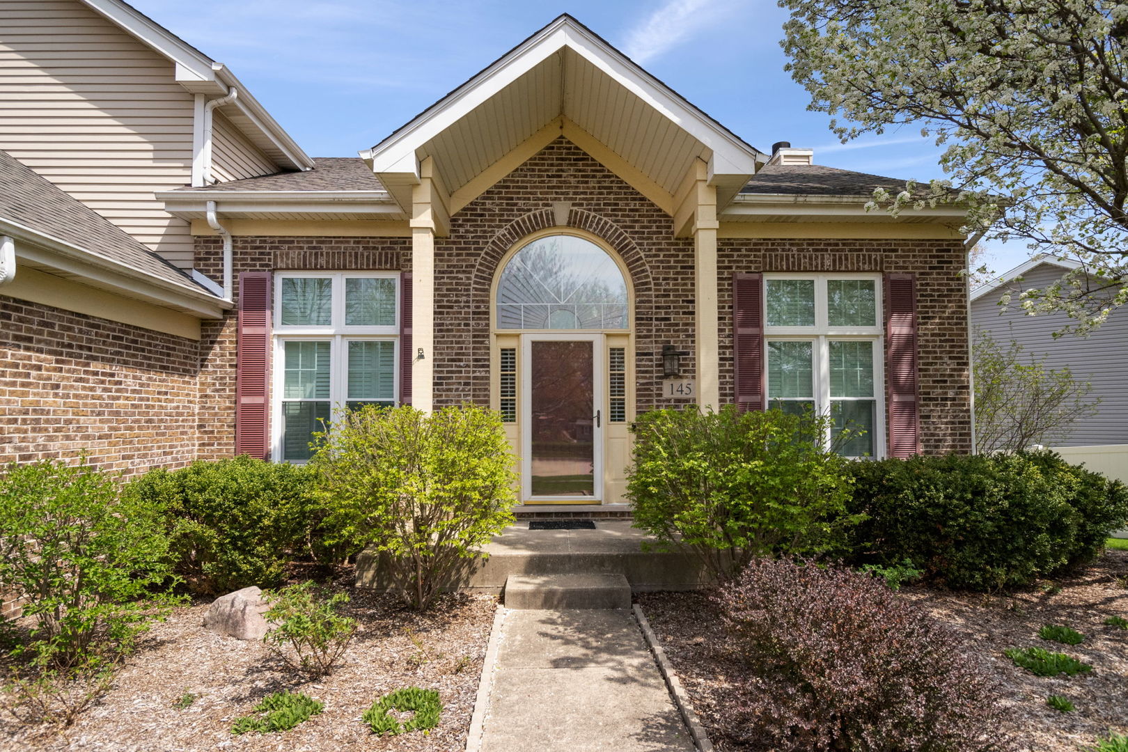 145 Barnes Road Elgin, IL 60124 - Photo 3 of 45 a front view of a house