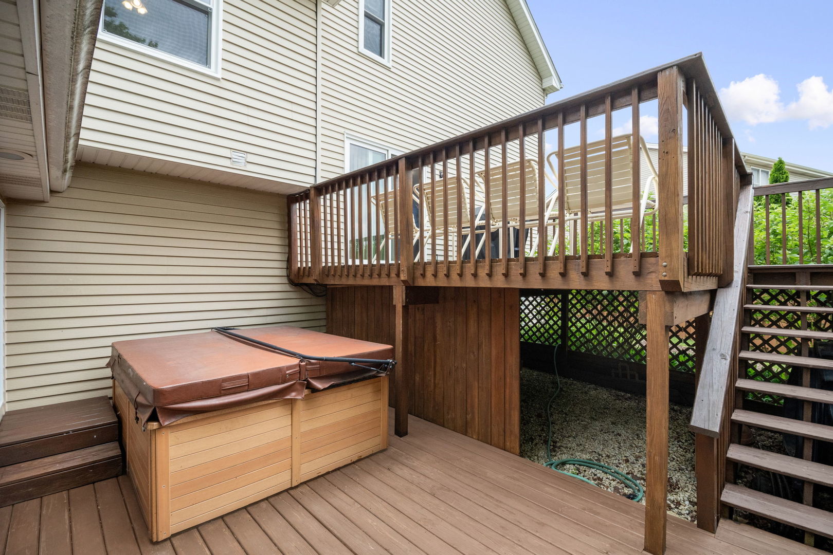145 Barnes Road Elgin, IL 60124 - Photo 36 of 45 a balcony with furniture and wooden floor