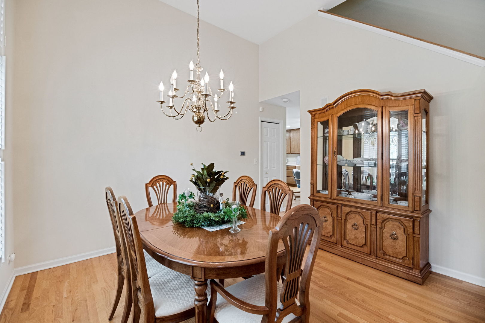 145 Barnes Road Elgin, IL 60124 - Photo 5 of 45 a view of a dining room with furniture window and wooden floor