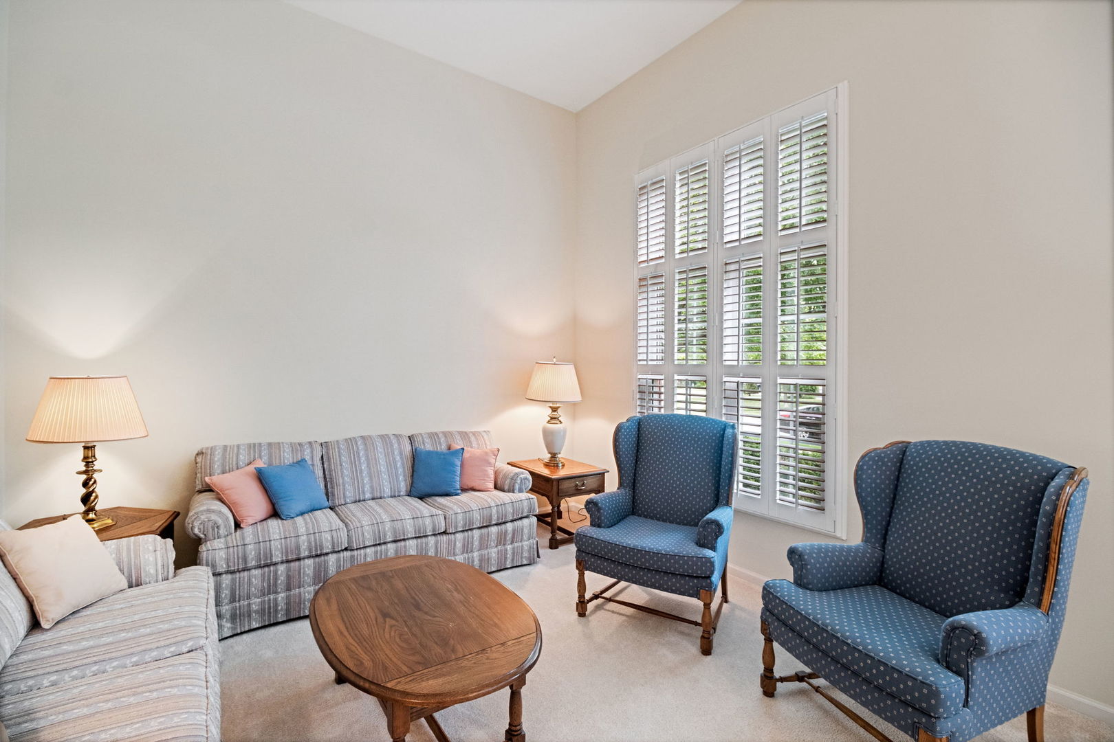 145 Barnes Road Elgin, IL 60124 - Photo 8 of 45 a living room with furniture and a window