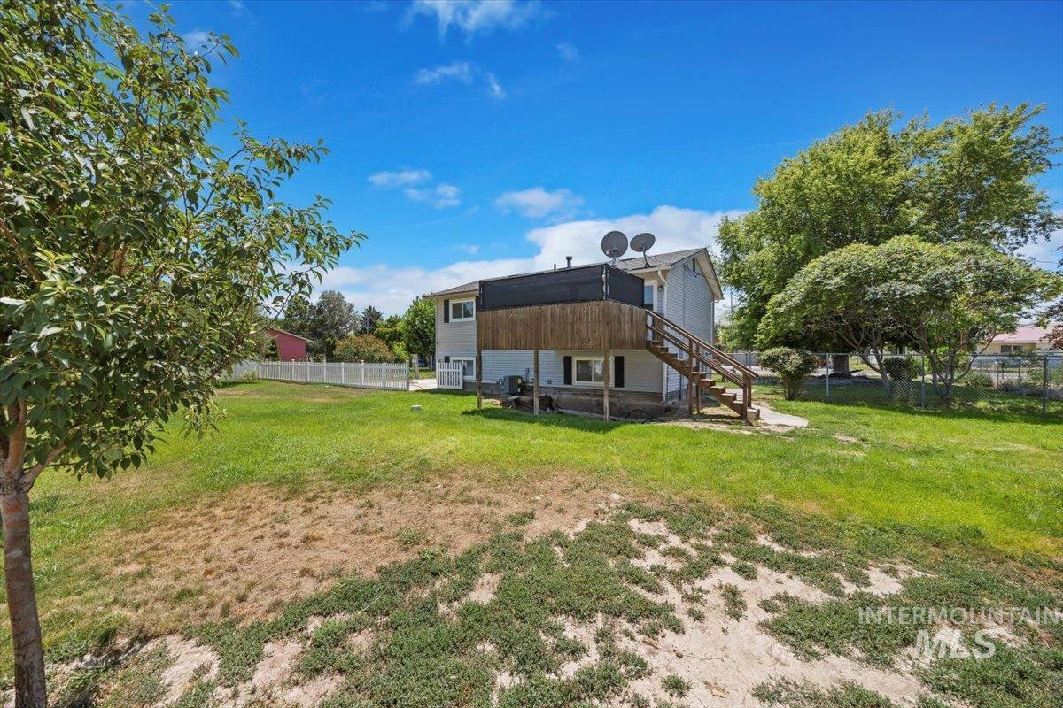 616 Doris Avenue Paul, ID 83347 - Photo 30 of 38 Fenced backyard with stairway