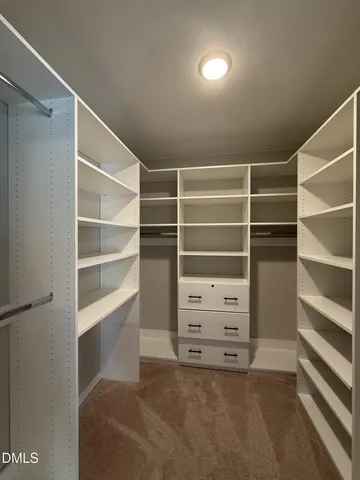 a view of balcony with wooden floor and fence