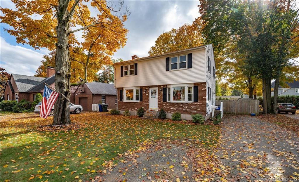 84 Spring Street Windsor Locks, CT 06096 - Photo 1 of 1 a view of a house with a yard covered in snow