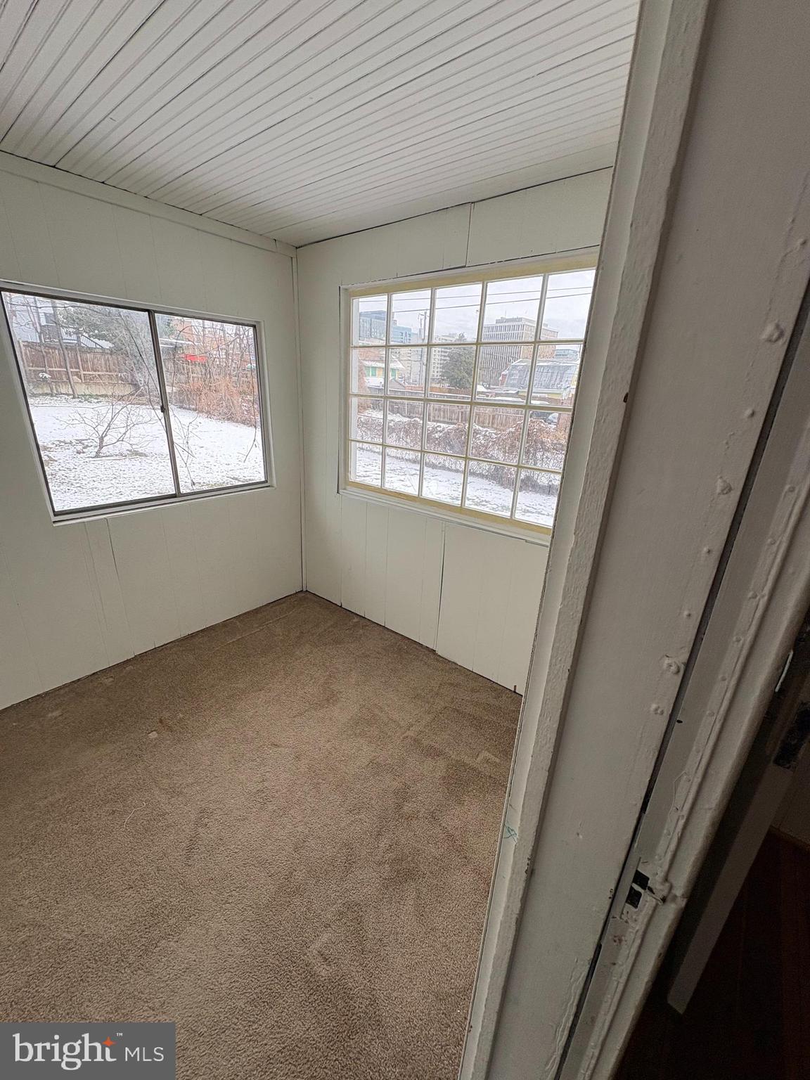 523 24th Street South Arlington, VA 22202 - Photo 12 of 18 an empty room with windows